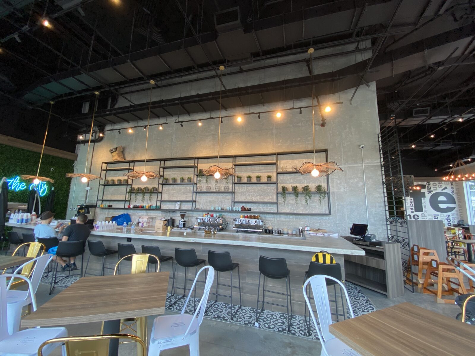 Restaurant using EZTube extrusion metal framing to build bars, tables, booths, lighting fixtures, storage racks, shelves, refrigerator organizers, coat racks, menu frames, and more. EZTube t slot style 80 tube 20 advanced extruded aluminum 6063 custom extrusion square frames